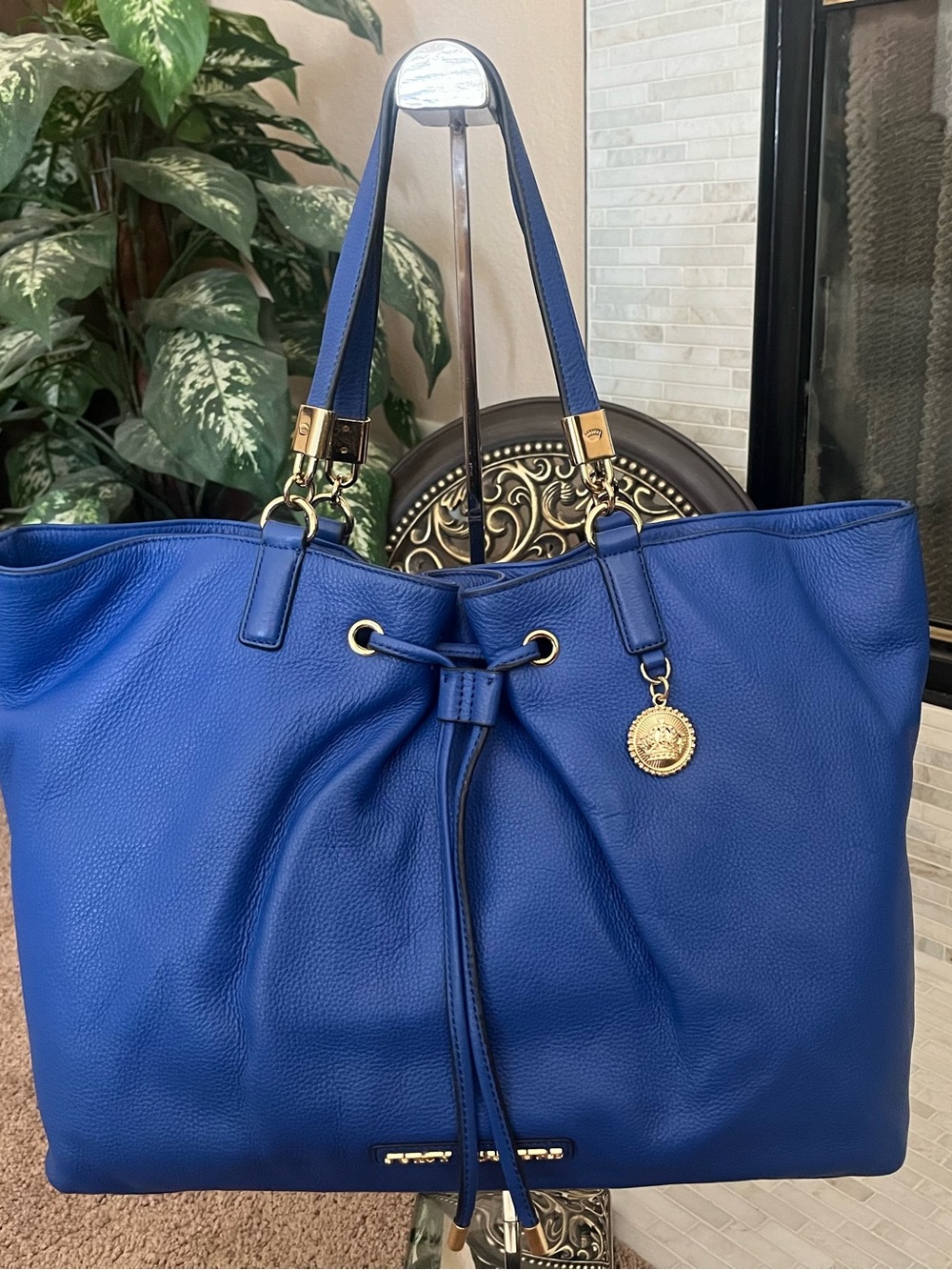 Juicy Couture Cobalt Blue Pebbled Leather Drawstring Tote with Gold Medallion